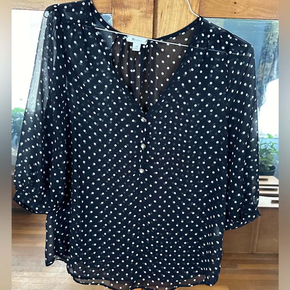 Everly navy and white polka dot blouse. Three quarter length sleeves. Medium.